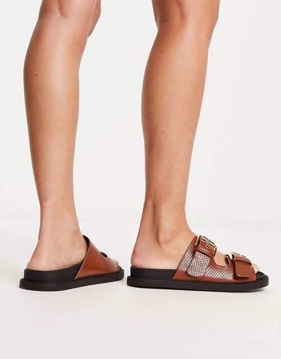 https://images.asos-media.com/products/london-rebel-chunky-double-buckle-footbed-slides-in-tan/203815328-2?$n_550w$&wid=550&fit=constrain