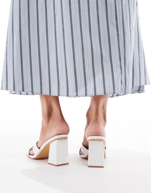 London Rebel crossover detail mules with high heel in white