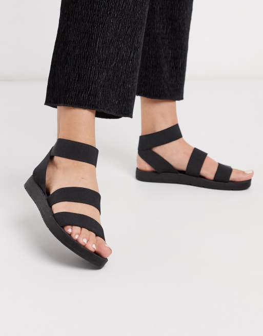 London Rebel elastic strap flat sandals in black | ASOS