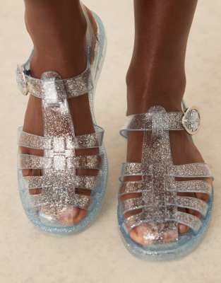London Rebel - Evie - Flache Jelly-Schuhe in Blau mit Glitzer