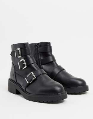 black flat buckle boots