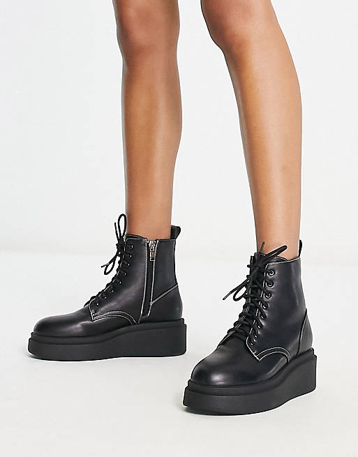 London Rebel flatfrom chunky lace up boots in black | ASOS