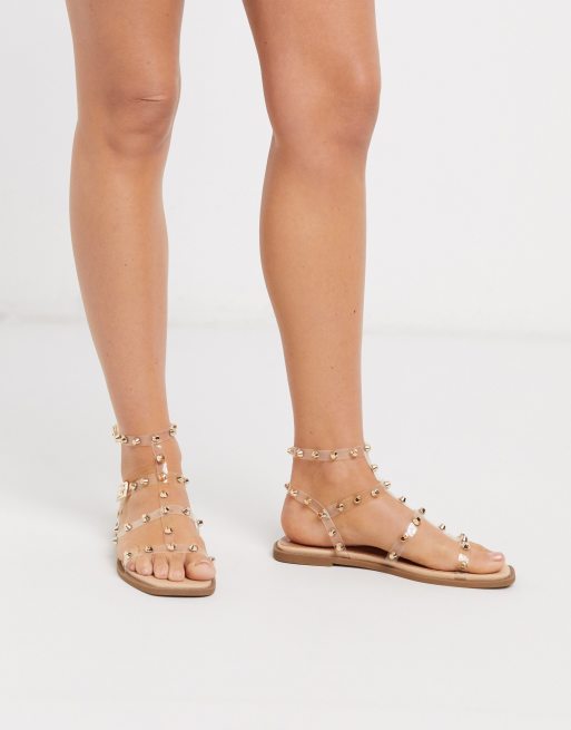 London Rebel gladiator stud flat sandals in clear | ASOS