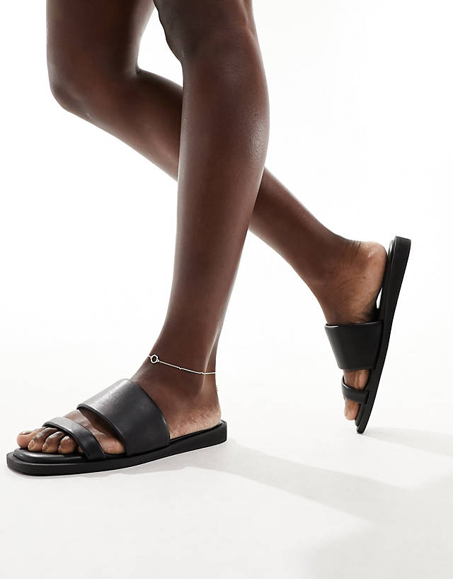 London Rebel - minimal strap flat sandals in black