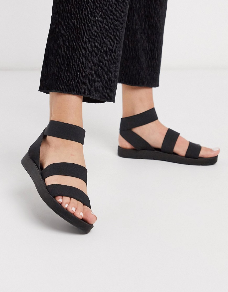 London Rebel - Platte sandalen met elastische band in zwart