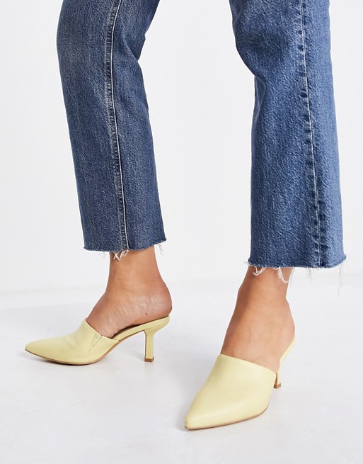 London Rebel pointed heeled mules in yellow