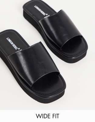 London Rebel – Sandalen im 90er-Jahre-Stil in Schwarz mit eckiger Zehenpartie und Plateausohle, weite Passform
