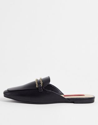 London Rebel slip on mules in black with chain