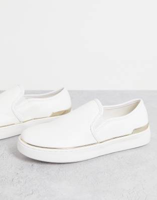 London Rebel slip on trainers with metal trim in white | ASOS