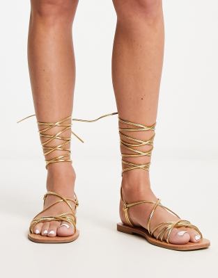 London Rebel Strappy Tie Leg Flat Sandals In Gold Metallic