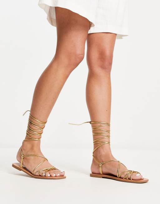 Gold flat store ankle strap sandals