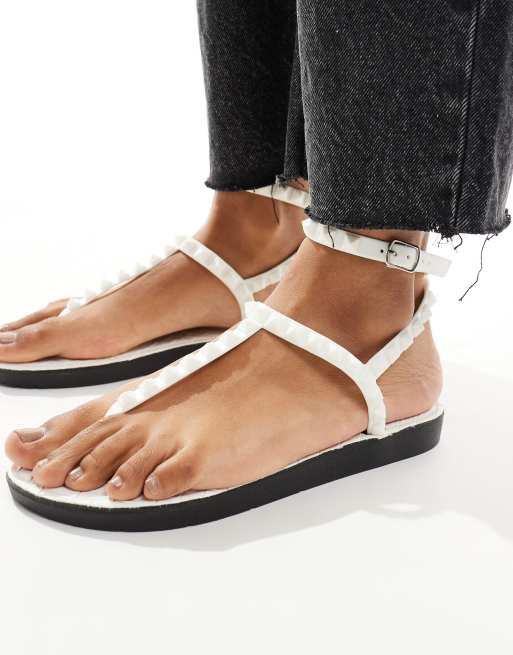 London Rebel studded t-bar ankle strap jelly sandals in black ...