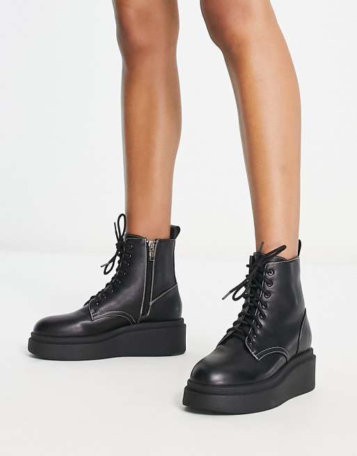 London Rebel – Svarta, grova flatform-boots med snörning