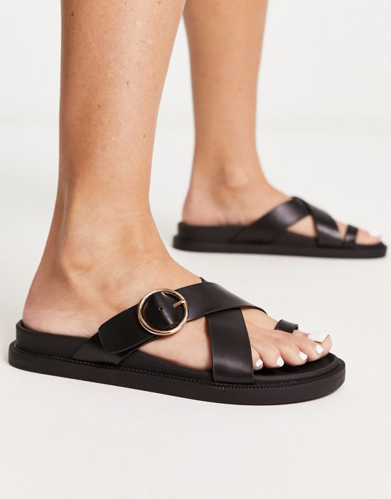 https://images.asos-media.com/products/london-rebel-toe-loop-buckle-sandals-in-black/203815566-1-black?$n_550w$&wid=550&fit=constrain