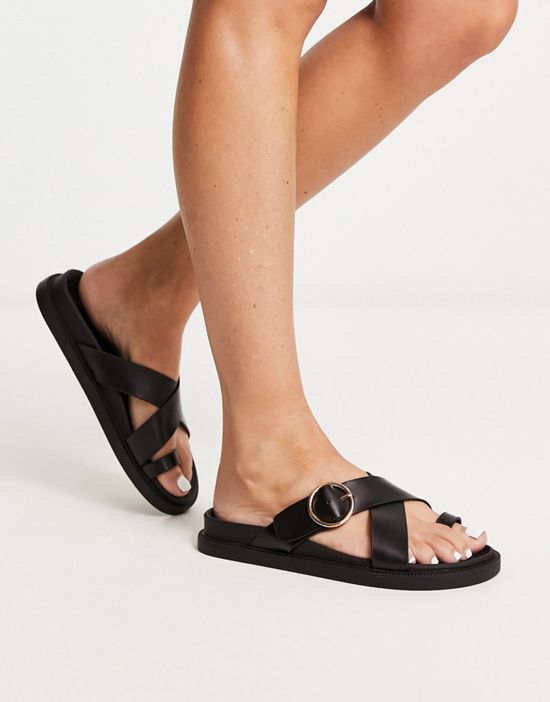 https://images.asos-media.com/products/london-rebel-toe-loop-buckle-sandals-in-black/203815566-4?$n_550w$&wid=550&fit=constrain