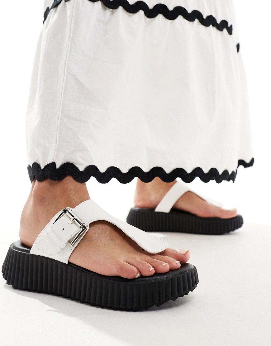London Rebel toe post buckle sandals in cream-White
