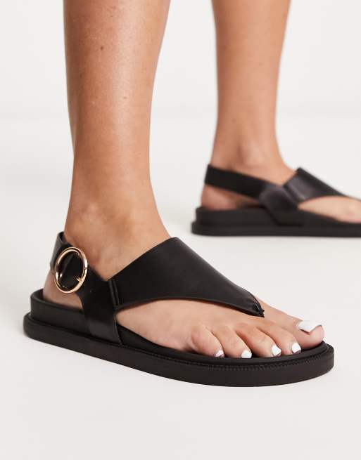 London Rebel toe thong footbed sandals in black ASOS