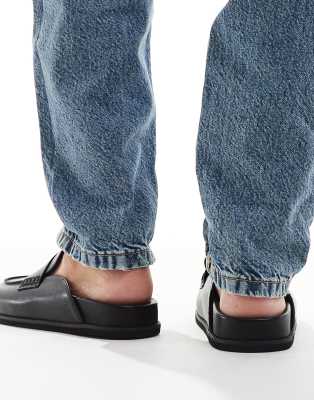 London Rebel Violet Slip On Mules In Black