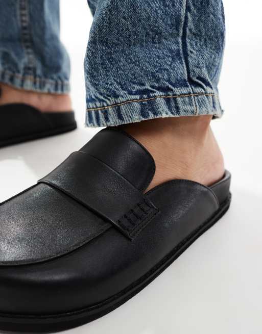 London Rebel Violet slip on mules in black