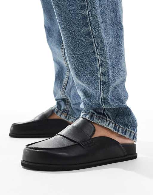 London Rebel Violet slip on mules in black