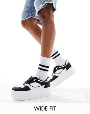 London Rebel Wide Fit chunky panelled flatform trainers in white and black