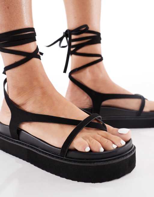 London Rebel Wide Fit thong sandals with strappy details in black faux suede