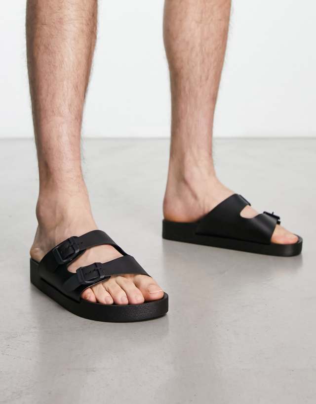 London Rebel X jelly buckle sliders in black