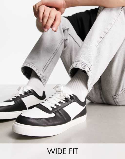 London Rebel X – Sneaker in Schwarz, weite Passform
