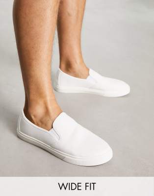 London Rebel X wide fit canvas slip on canvas sneakers in white