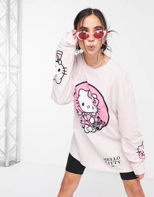 фото Лонгслив в стиле oversized с рисунком на груди и рукавах new girl order x hello kitty-розовый цвет