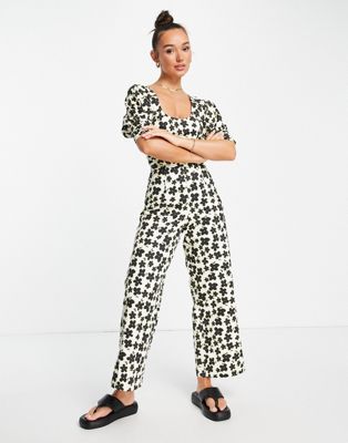 Lost Ink puff sleeve waist detail jumpsuit with tie neck in multi floral