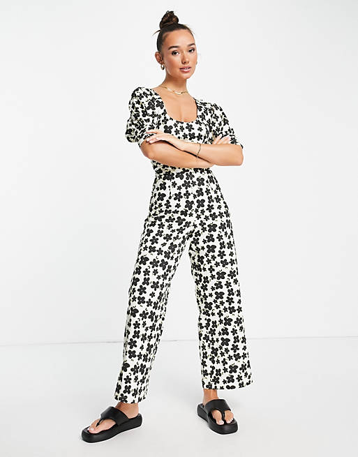 Lost Ink puff sleeve waist detail jumpsuit with tie neck in multi floral