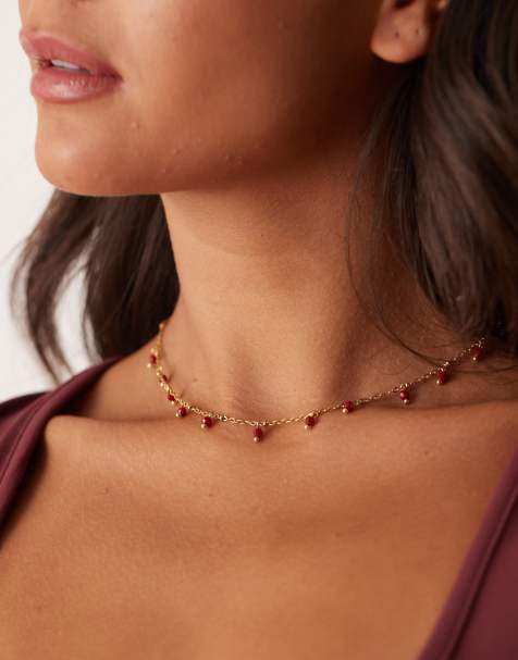 Lost Souls - 18k vergulde ketting van roestvrij staal met rode stenen hangertjes - view 1