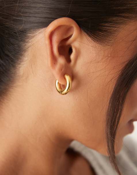 Lost Souls 20mm tube huggie hoop earrings in 18kt gold plated stainless steel - view 1