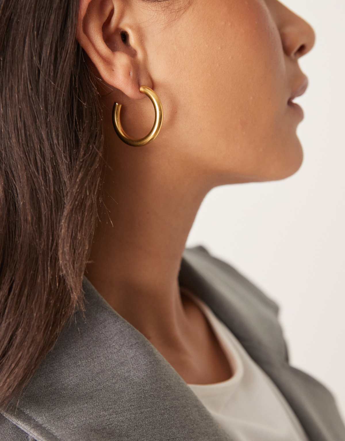 Lost Souls 28mm tube hoop earrings in 18ct gold plated stainless steel
