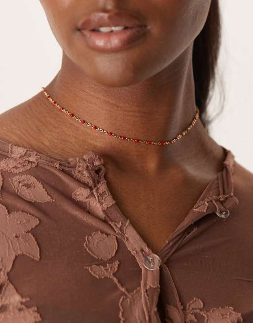 Lost Souls - Collana in acciaio inossidabile placcata in oro 18 kt con perline smaltate rosse