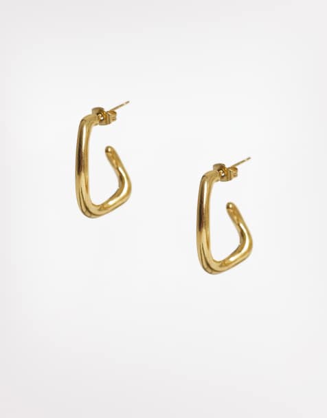 Lost souls curved oval hoop earrings in 18k gold plated stainless steel - view 1