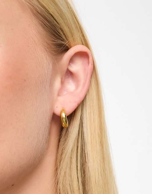Lost Souls – Guldfärgade creoler i rostfritt stål med böjd design
