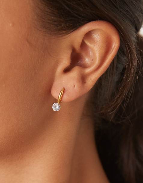 Lost Souls huggie hoop earrings with crystal teardrop in 18ct gold plated stainless steel - view 1