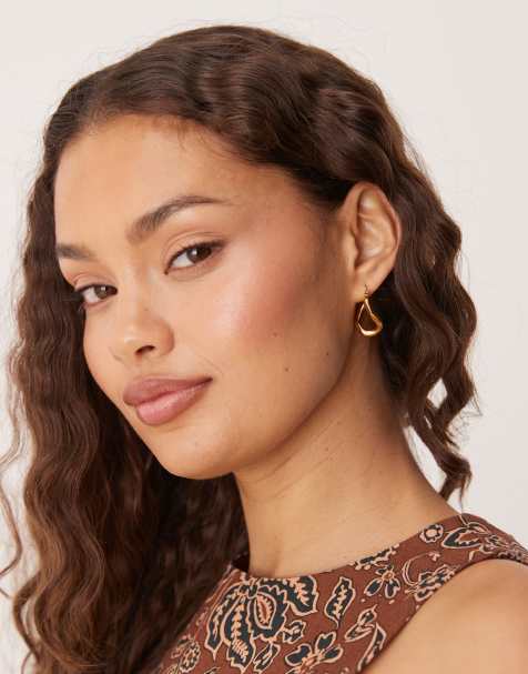 Lost Souls irregular hoop earrings in 18kt gold plated stainless steel - view 1