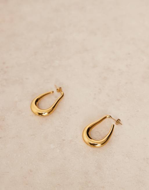 Lost Souls irregular hoop earrings in 18kt gold plated stainless steel, 2 of 3