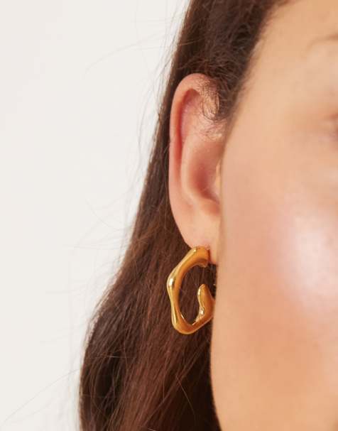 Lost Souls molten effect hoop earrings in 18ct gold plated stainless steel - view 1