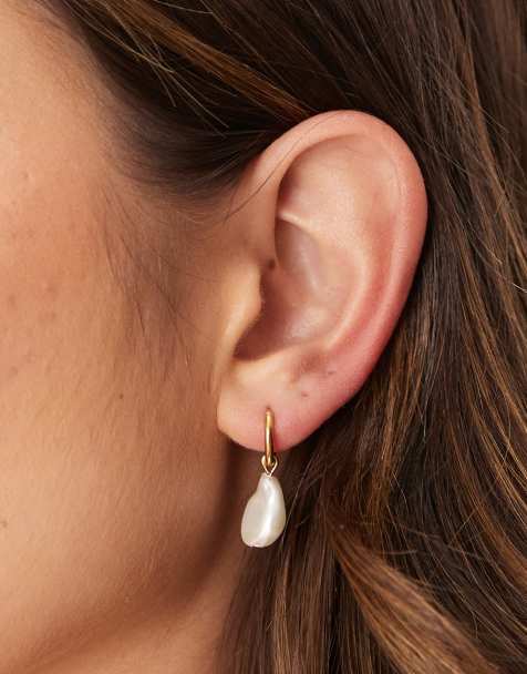 Lost Souls small huggie hoop earrings with pearl charm in 18ct gold plated stainless steel - view 1