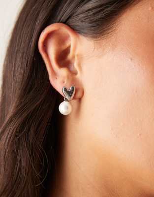 Lost Souls stainless steel heart and pearl stud earrings in silver - view 1