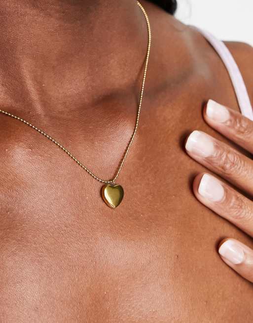Lost Souls stainless steel heart pendant necklace in gold
