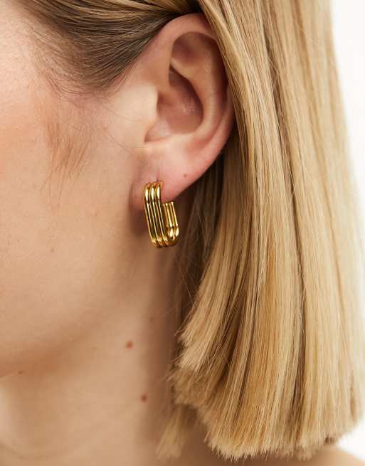 Lost Souls stainless steel oval hoop earrings in gold tone ASOS