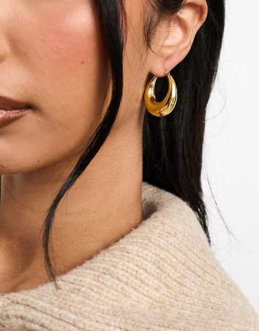 Lost Souls stainless steel teardrop hoop earrings in gold