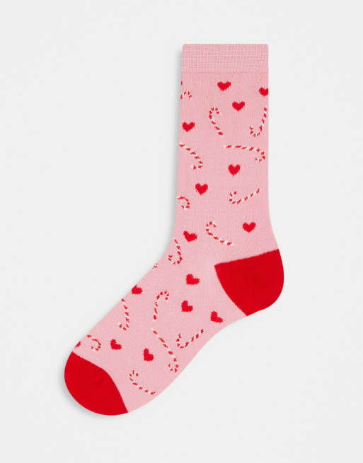 Loungeable Christmas candy cane socks in pink and red | ASOS