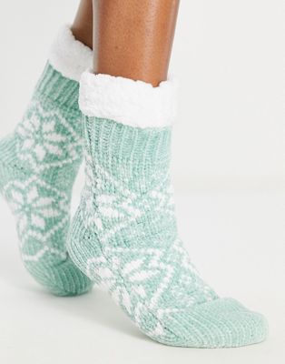Loungeable cosy chenille slipper sock in green snowflake print