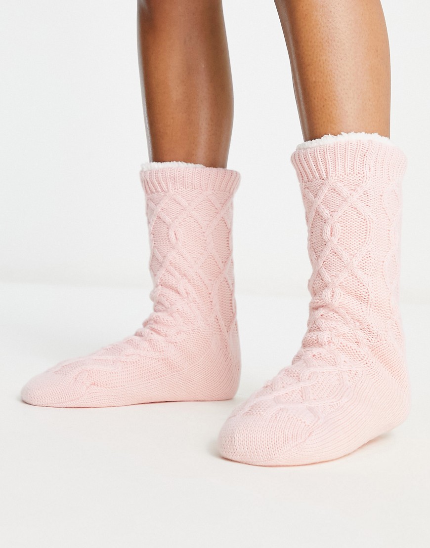 Loungeable cozy cable knit slipper sock in pink